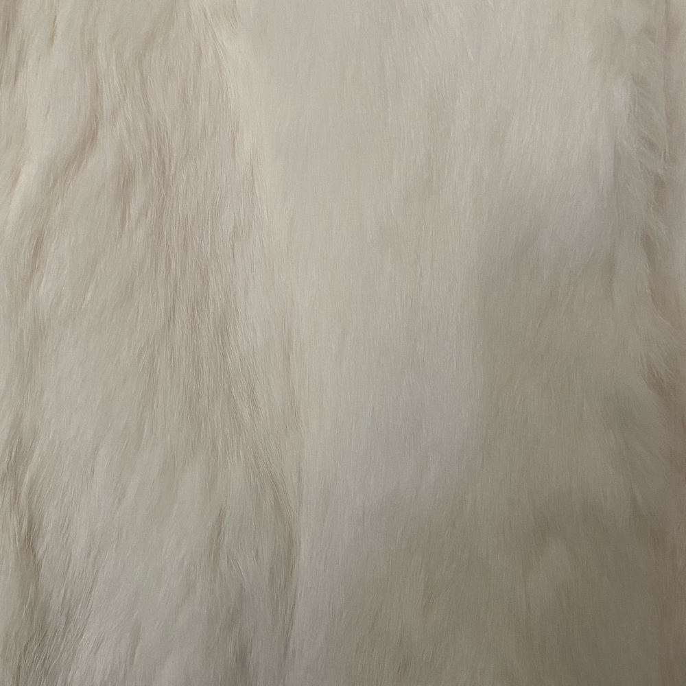 Fur baseball jacket.